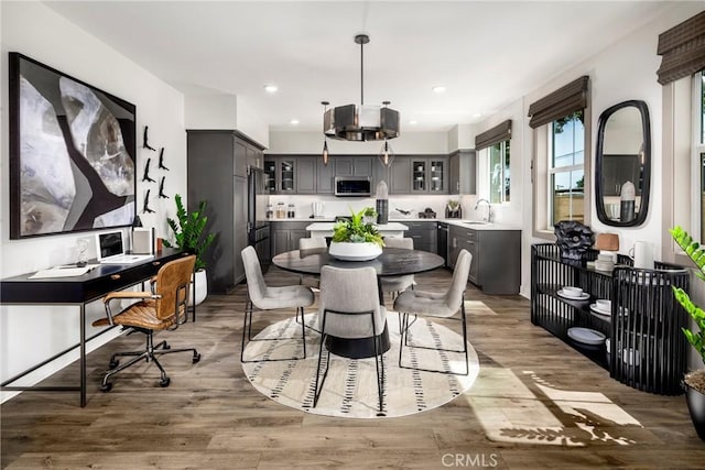 11733 Florence Ave, Santa Fe Springs, CA 90670 - dining area featuring wood finished floors and recessed lighting