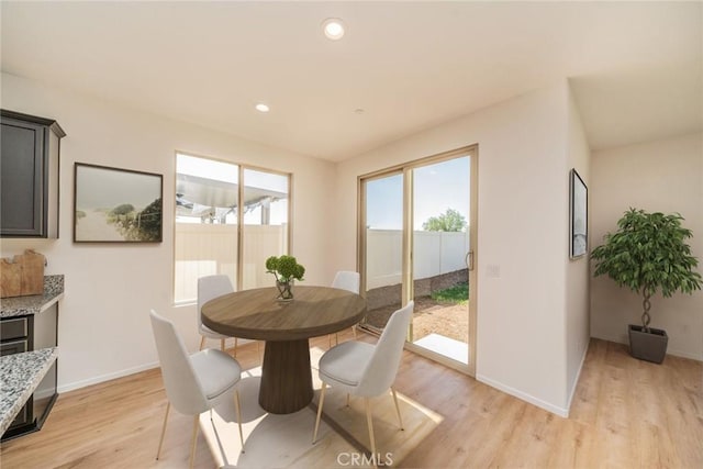 1060 Fortuna St, Perris, CA 92571 - dining area with light wood finished floors, baseboards, and recessed lighting