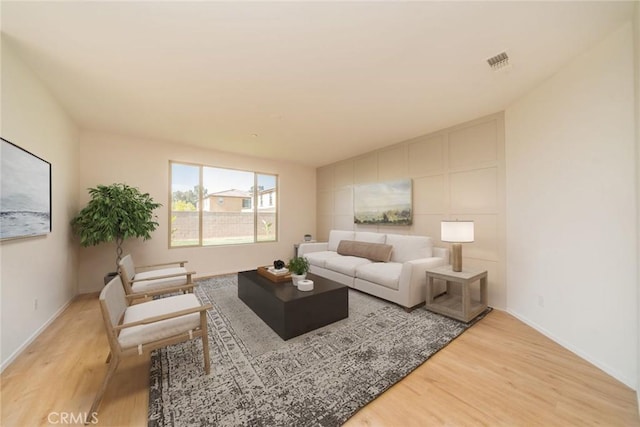 1060 Fortuna St, Perris, CA 92571 - living room featuring light wood-style floors and baseboards