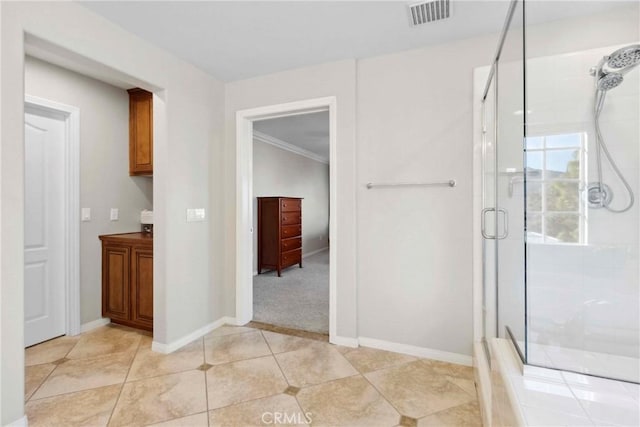 45614 Hawk Ct, Temecula, CA 92592 - bathroom with a stall shower, tile patterned floors, baseboards, and vanity