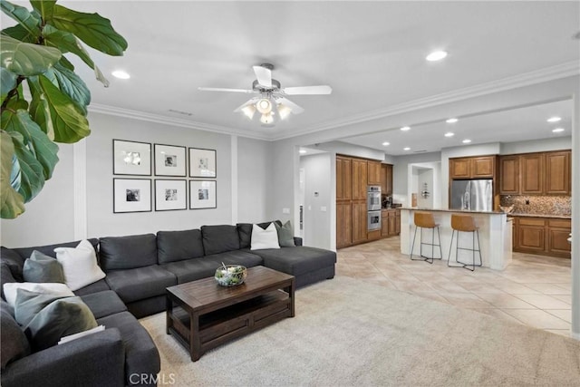 45614 Hawk Ct, Temecula, CA 92592 - living room with light tile patterned floors, recessed lighting, ornamental molding, and a ceiling fan