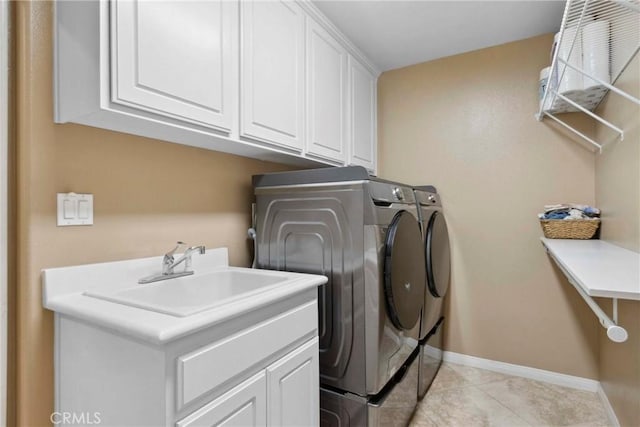 45614 Hawk Ct, Temecula, CA 92592 - laundry area featuring cabinet space, washing machine and dryer, baseboards, and light tile patterned floors