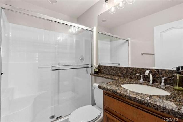 45614 Hawk Ct, Temecula, CA 92592 - bathroom with vanity, a shower stall, and toilet
