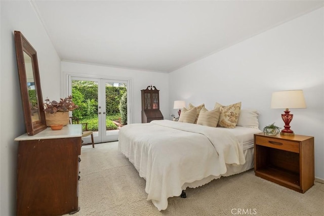 27 S La Senda Dr, Laguna Beach, CA 92651 - bedroom featuring access to outside, light colored carpet, and french doors