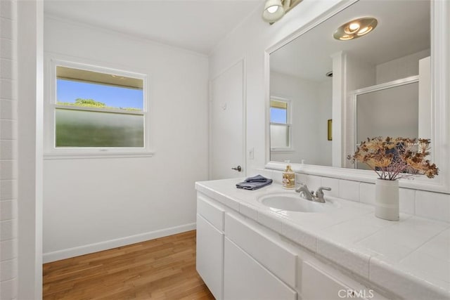 27 S La Senda Dr, Laguna Beach, CA 92651 - full bathroom featuring vanity, wood finished floors, a shower stall, and baseboards