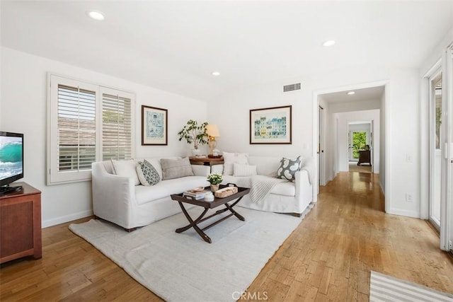27 S La Senda Dr, Laguna Beach, CA 92651 - living room with light wood-type flooring, recessed lighting, and baseboards