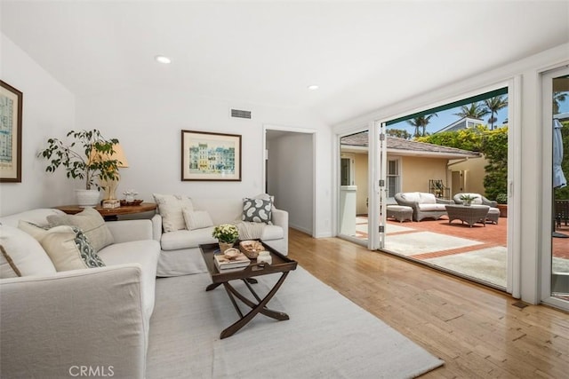 27 S La Senda Dr, Laguna Beach, CA 92651 - living room featuring wood finished floors and recessed lighting