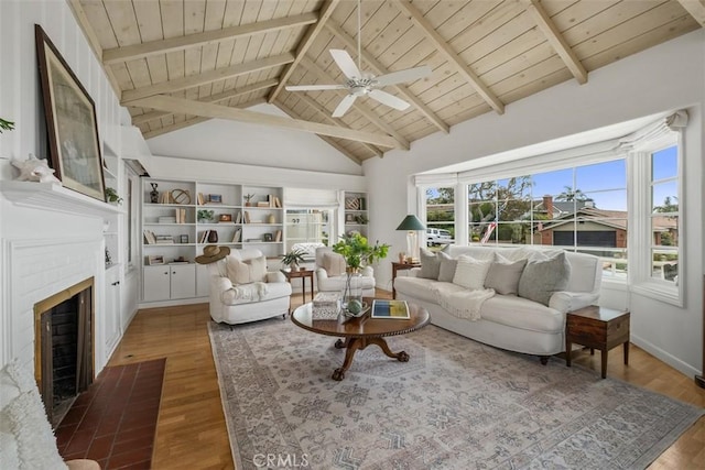 27 S La Senda Dr, Laguna Beach, CA 92651 - living area featuring wooden ceiling, ceiling fan, wood finished floors, a fireplace, and baseboards