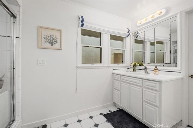 27 S La Senda Dr, Laguna Beach, CA 92651 - full bath featuring vanity, baseboards, a shower with door, tile patterned floors, and ornamental molding