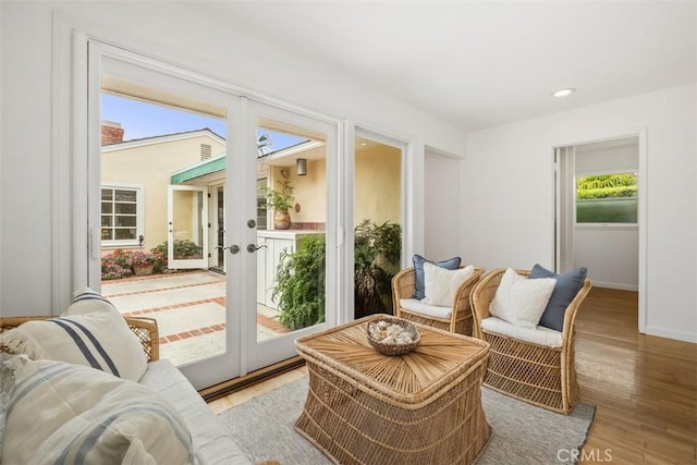 27 S La Senda Dr, Laguna Beach, CA 92651 - living room with french doors, light wood finished floors, baseboards, and recessed lighting