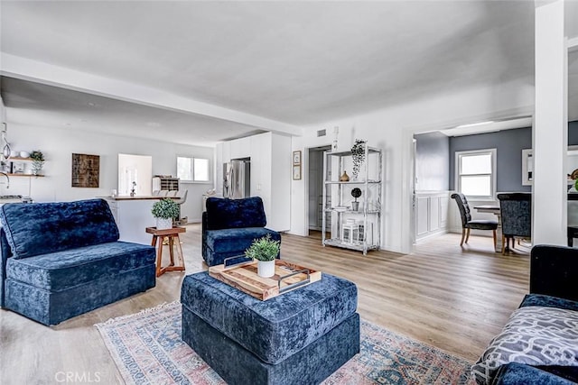 320 E Walnut Ave, El Segundo, CA 90245 - living room with healthy amount of natural light and light wood-style floors