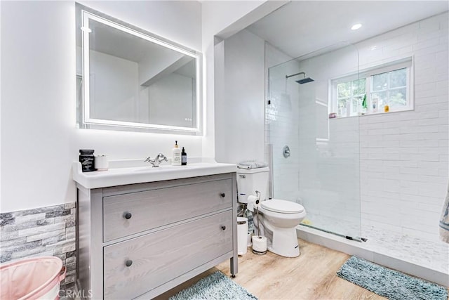 320 E Walnut Ave, El Segundo, CA 90245 - full bathroom with toilet, tiled shower, vanity, and wood finished floors