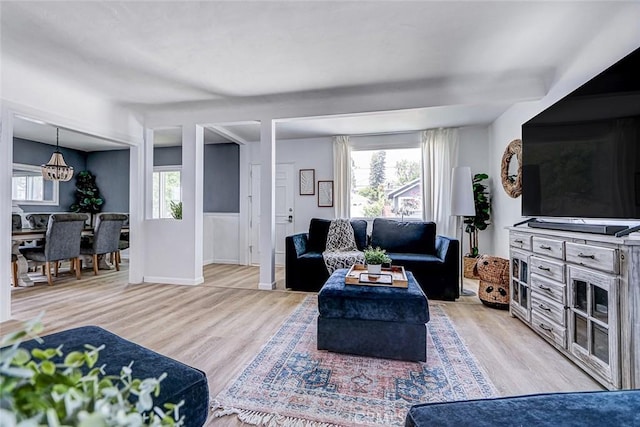 320 E Walnut Ave, El Segundo, CA 90245 - living room featuring plenty of natural light, light wood-style floors, and baseboards