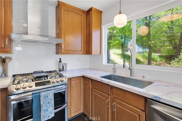 28720 Zion Dr, Lake Arrowhead, CA 92352 - kitchen featuring stainless steel appliances, wall chimney exhaust hood, backsplash, and light stone counters
