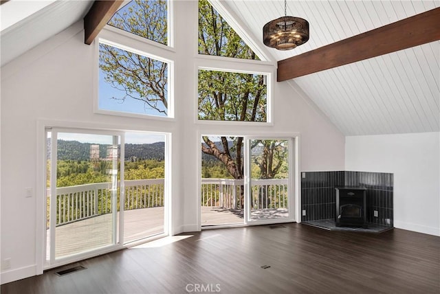 28720 Zion Dr, Lake Arrowhead, CA 92352 - unfurnished living room with high vaulted ceiling, beam ceiling, wood finished floors, and a wood stove