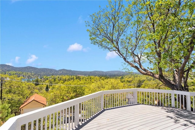 28720 Zion Dr, Lake Arrowhead, CA 92352 - wooden terrace with a view of trees and a mountain view