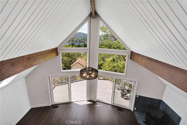 28720 Zion Dr, Lake Arrowhead, CA 92352 - unfurnished living room with beamed ceiling, wood finished floors, baseboards, a mountain view, and high vaulted ceiling