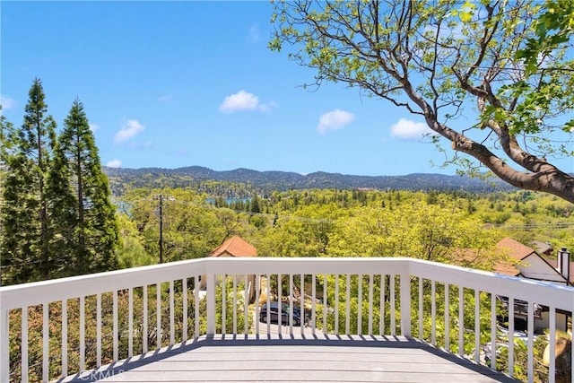 28720 Zion Dr, Lake Arrowhead, CA 92352 - wooden terrace with a forest view and a mountain view