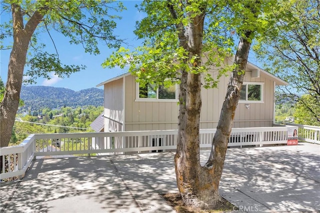 28720 Zion Dr, Lake Arrowhead, CA 92352 - deck with a mountain view and concrete driveway