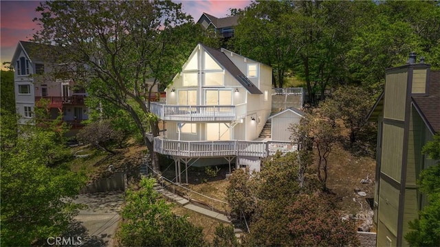 28720 Zion Dr, Lake Arrowhead, CA 92352 - back of property at dusk with stairs