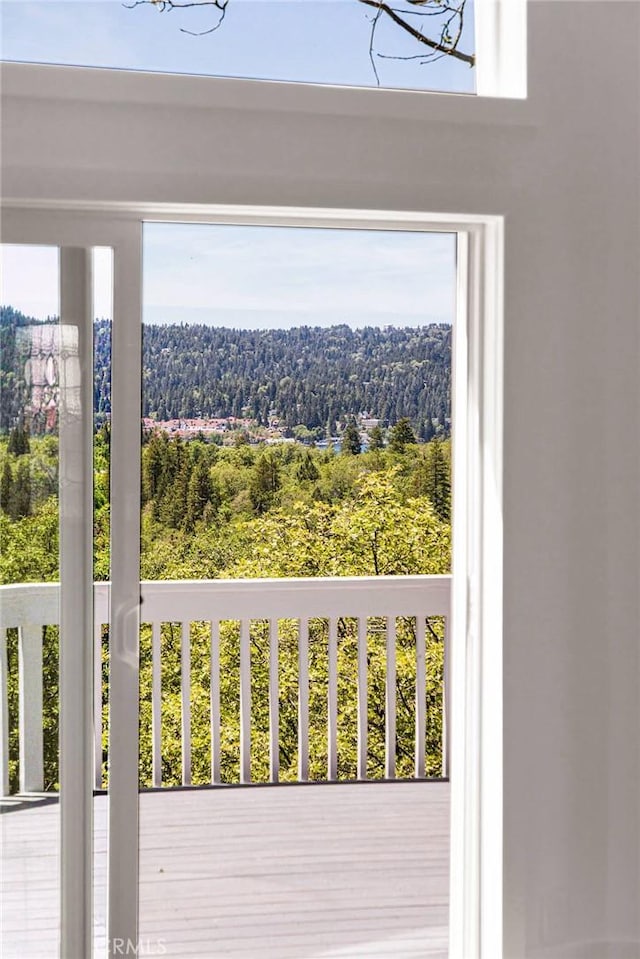 28720 Zion Dr, Lake Arrowhead, CA 92352 - wooden terrace featuring a forest view