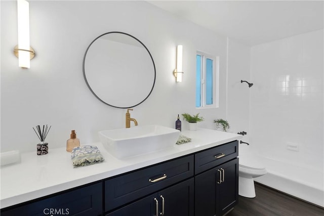 28720 Zion Dr, Lake Arrowhead, CA 92352 - bathroom with vanity, wood finished floors, and shower / bathtub combination