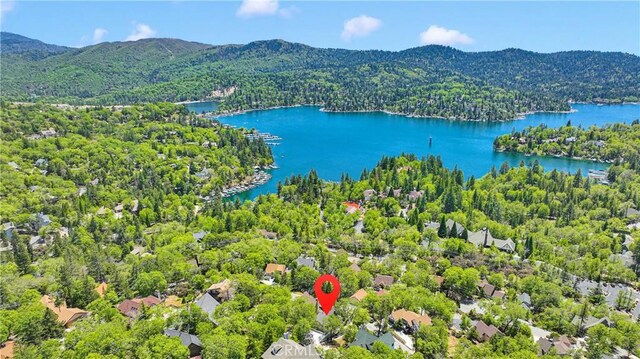 28720 Zion Dr, Lake Arrowhead, CA 92352 - drone / aerial view of a water and mountain view and a heavily wooded area