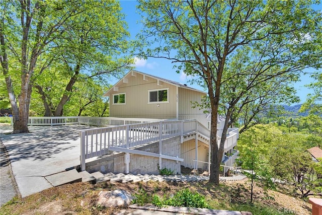 28720 Zion Dr, Lake Arrowhead, CA 92352 - rear view of house featuring a wooden deck