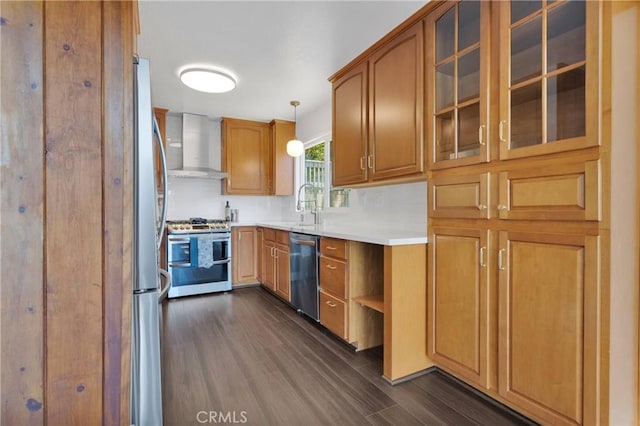 28720 Zion Dr, Lake Arrowhead, CA 92352 - kitchen featuring appliances with stainless steel finishes, wall chimney range hood, dark wood finished floors, light countertops, and glass insert cabinets