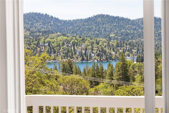 28720 Zion Dr, Lake Arrowhead, CA 92352 - water view featuring a heavily wooded area and a mountainous background