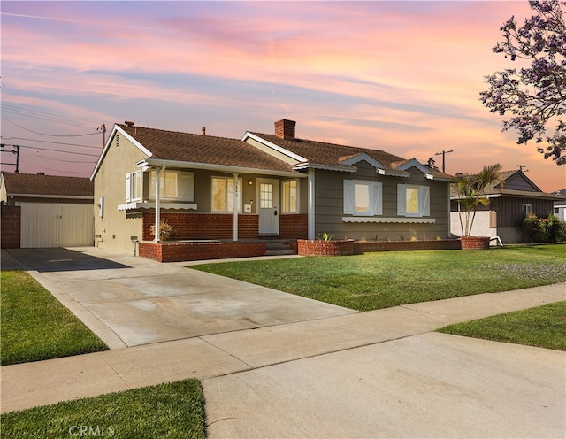 1840 W Southgate Ave, Fullerton, CA 92833 - ranch-style home with a porch, a front lawn, driveway, and a chimney