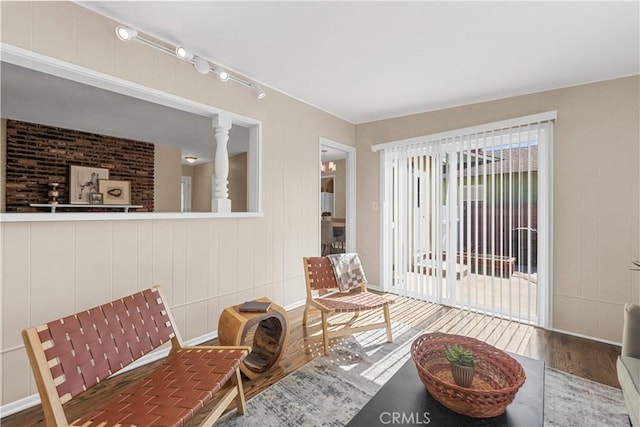 1840 W Southgate Ave, Fullerton, CA 92833 - sitting room with wood finished floors, decorative columns, and rail lighting