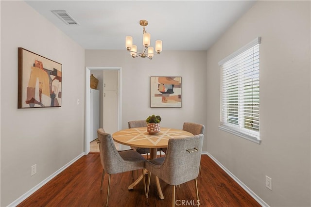 1840 W Southgate Ave, Fullerton, CA 92833 - dining room with a chandelier, dark wood-type flooring, and baseboards