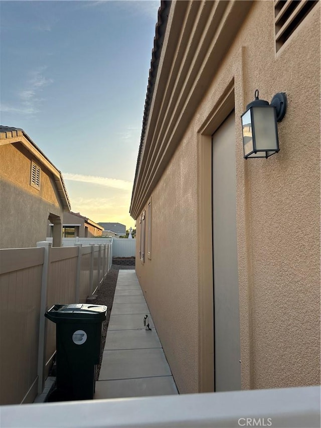 10030 El Dorado St, Apple Valley, CA 92308 - property exterior at dusk with stucco siding