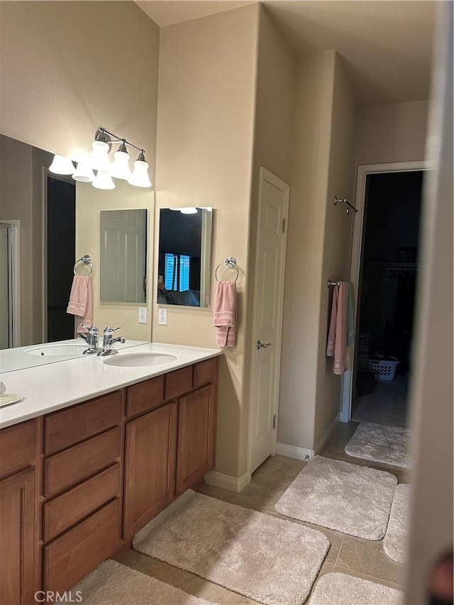 10030 El Dorado St, Apple Valley, CA 92308 - full bathroom featuring double vanity and tile patterned floors