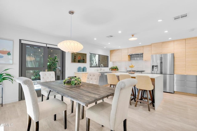 684 Orange Dr, Sierra Madre, CA 91024 - dining space with light wood-style floors, recessed lighting, and plenty of natural light