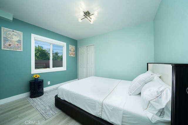 1405 W Saint Gertrude Pl, Santa Ana, CA 92704 - bedroom featuring wood finished floors, baseboards, and a closet