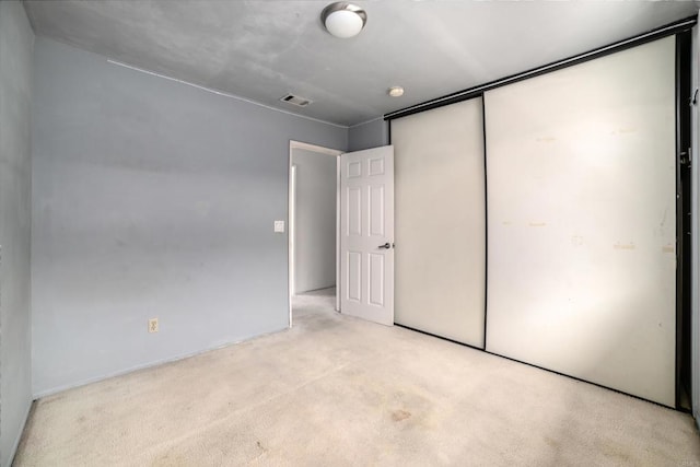 241 Saguaro Pl, Oceanside, CA 92057 - unfurnished bedroom featuring light colored carpet and a closet
