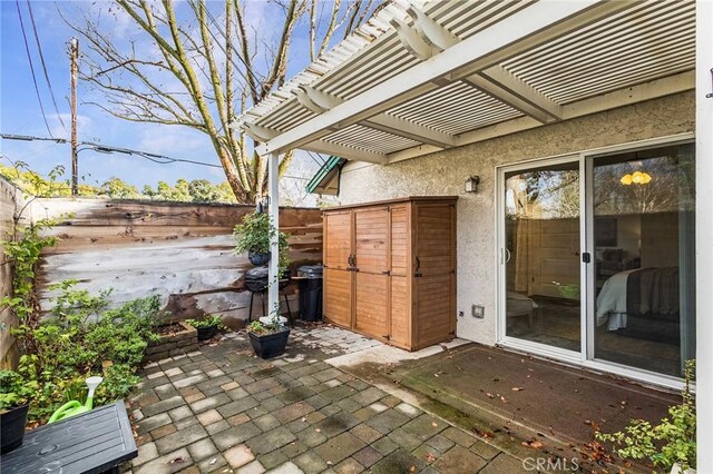 1125 Sheridan Ave Unit 68, Chico, CA 95926 - fenced backyard with a patio area and a pergola