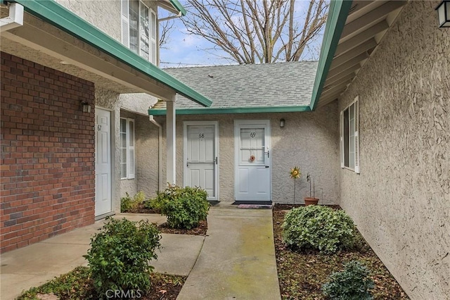 1125 Sheridan Ave Unit 68, Chico, CA 95926 - doorway to property featuring stucco siding and roof with shingles