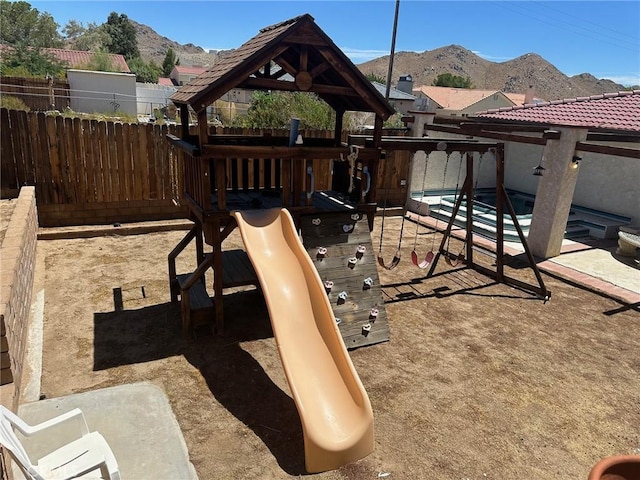 16485 Wintun Rd, Apple Valley, CA 92307 - view of playground with a mountain view and a gazebo