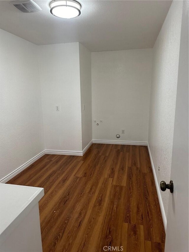 16485 Wintun Rd, Apple Valley, CA 92307 - unfurnished room with wood finished floors and baseboards