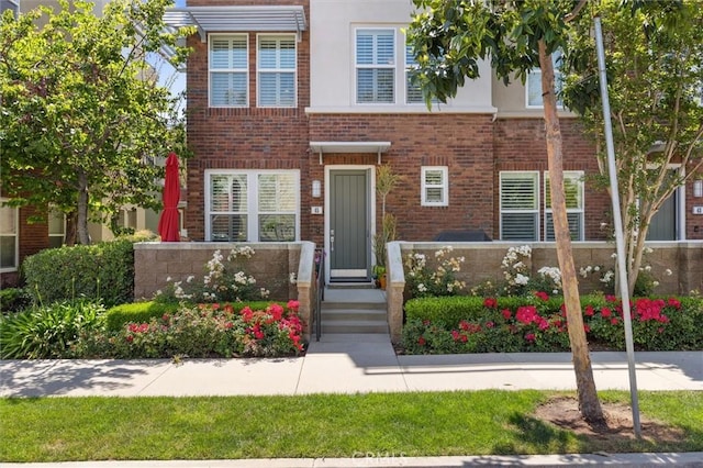 45 Brownstone Way, Aliso Viejo, CA 92656 - townhome / multi-family property featuring brick siding