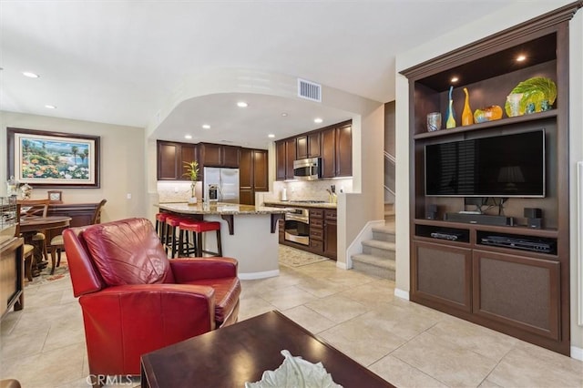 45 Brownstone Way, Aliso Viejo, CA 92656 - living area featuring recessed lighting, stairway, and light tile patterned floors