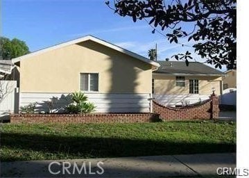 19023 Cantlay St, Reseda, CA 91335 - view of side of property featuring stucco siding