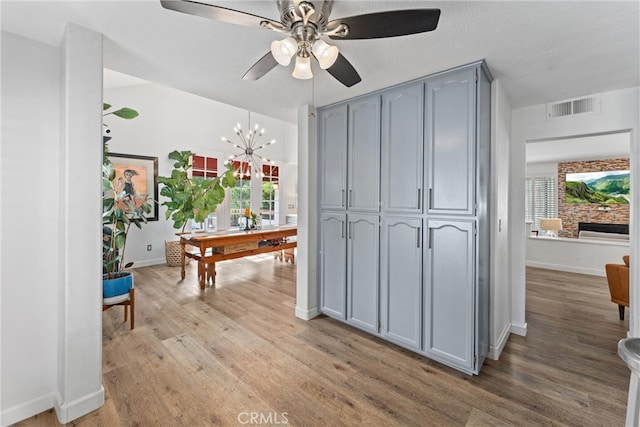 19431 Ranch Ln Unit 101, Huntington Beach, CA 92648 - hallway with wood finished floors, healthy amount of natural light, and baseboards