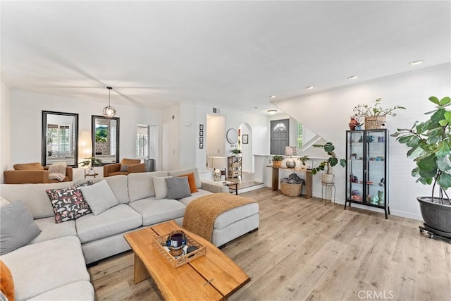 19431 Ranch Ln Unit 101, Huntington Beach, CA 92648 - living room featuring light wood-style flooring, baseboards, and recessed lighting