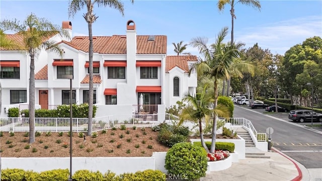 19431 Ranch Ln Unit 101, Huntington Beach, CA 92648 - view of property featuring uncovered parking