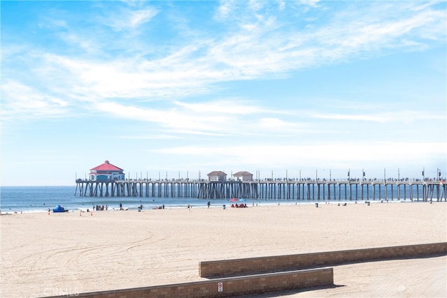 19431 Ranch Ln Unit 101, Huntington Beach, CA 92648 - water view featuring a pier and nearby beach