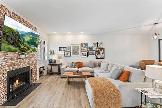 19431 Ranch Ln Unit 101, Huntington Beach, CA 92648 - living area with a fireplace with flush hearth, light wood-type flooring, and recessed lighting